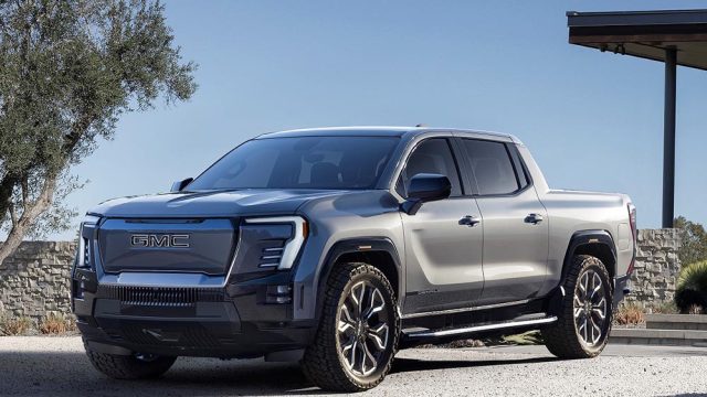 The first-ever GMC Sierra EV Denali Edition 1 from a front 3/4 view.